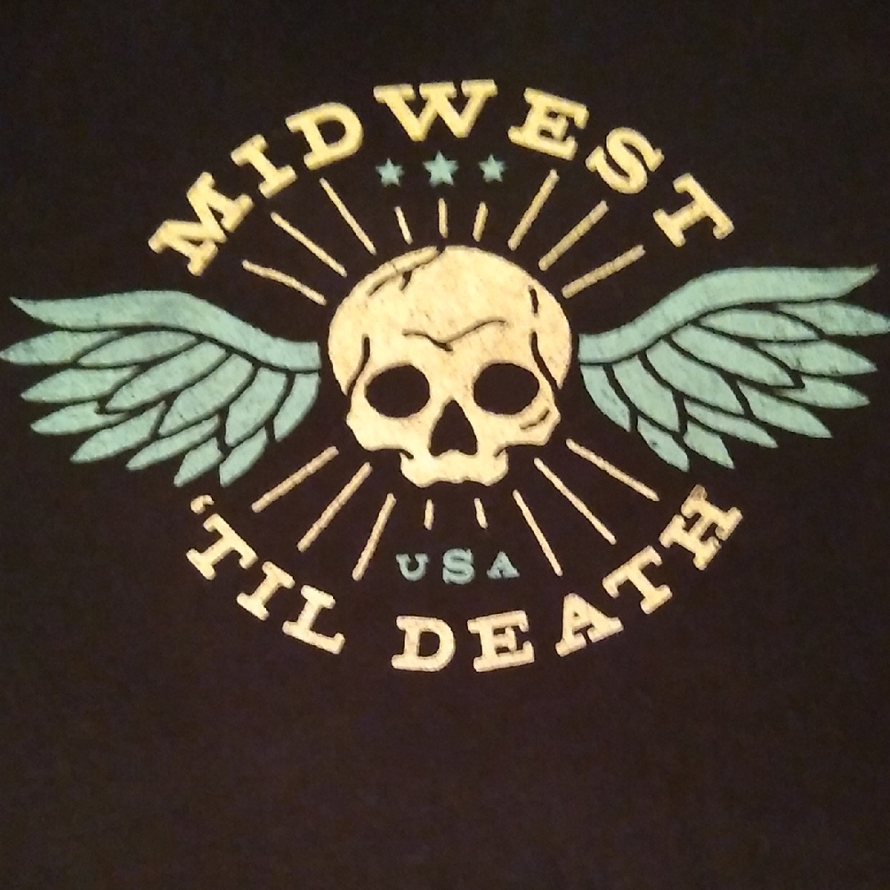Graphic Tee with Skull and Wings Design